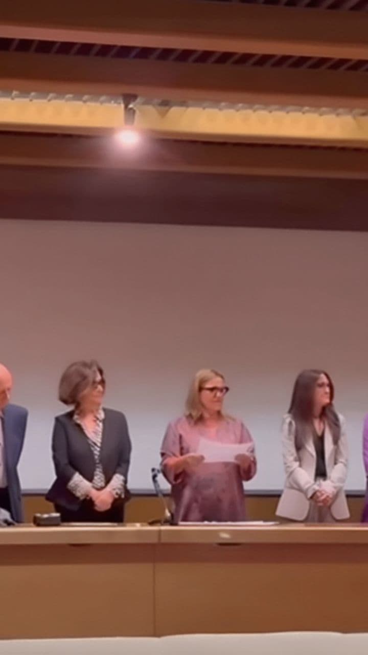 Professional Lecture Hall Handshake