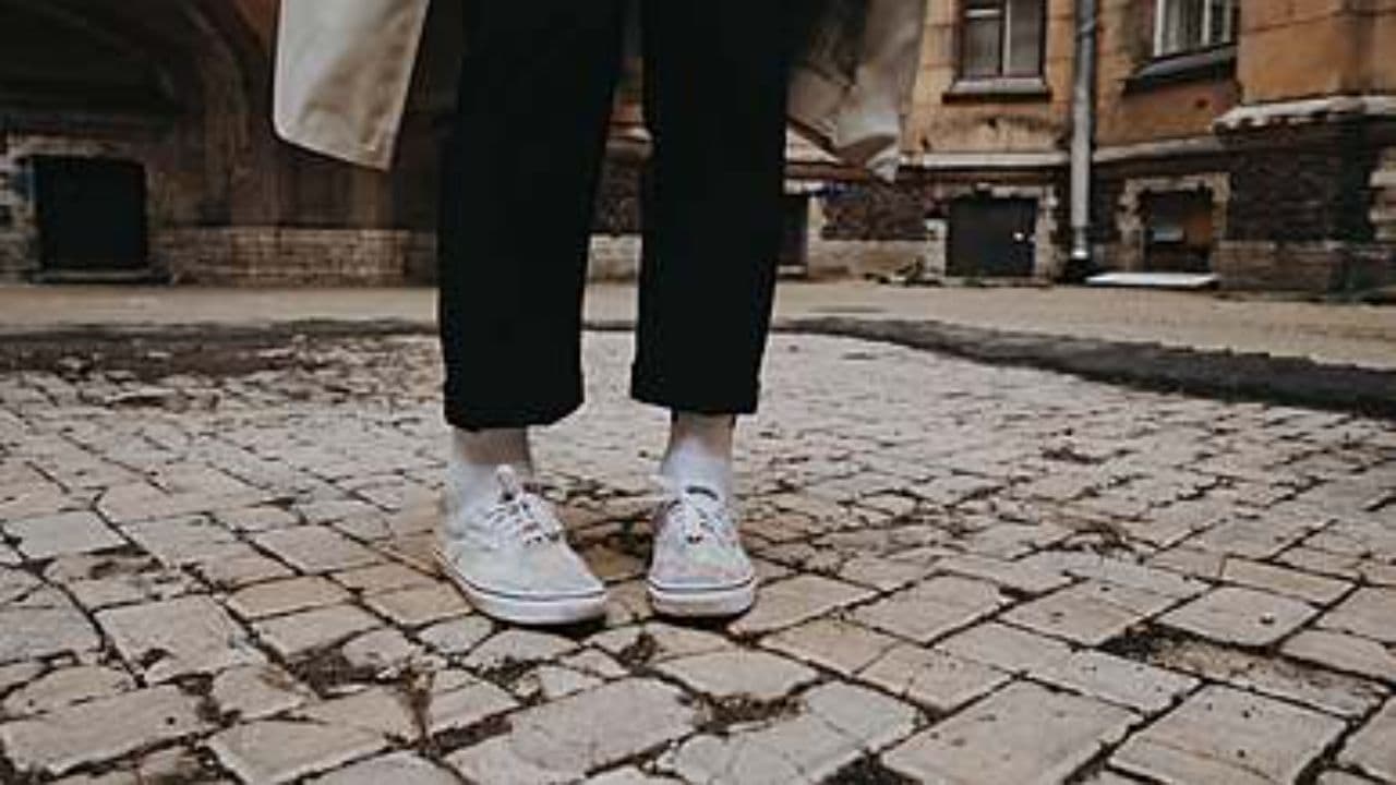 Man Relaxing on Rock Edge