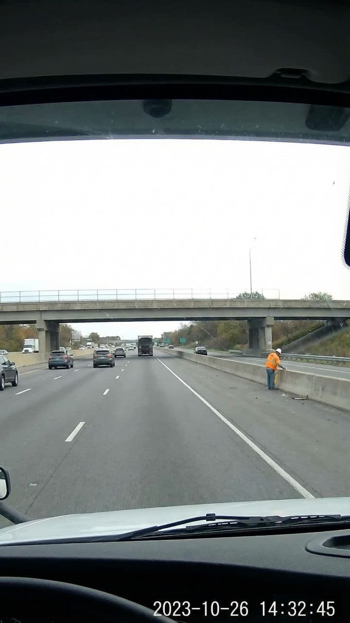 Semi-Truck Stops Inches From Falling Worker
