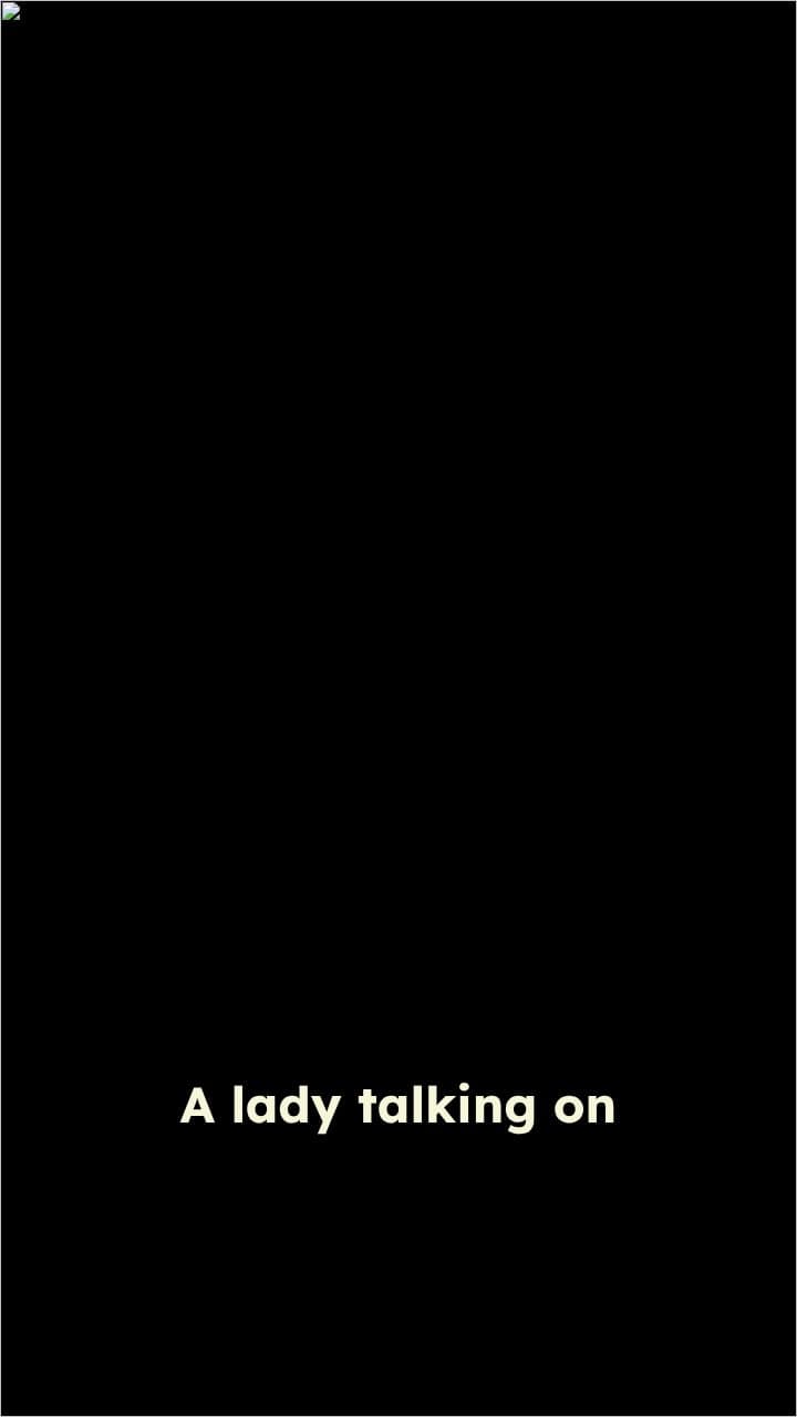 Lady on the Phone in Hall