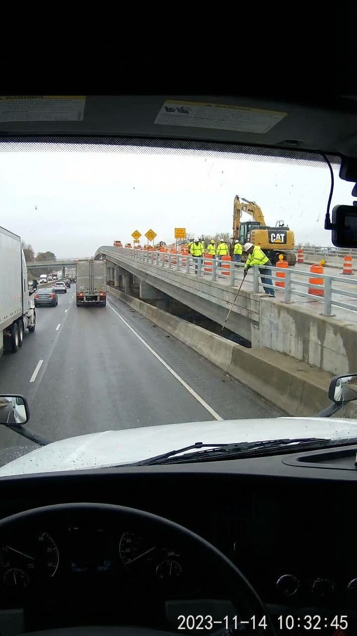 Semi Stops Inches From Hanging Worker
