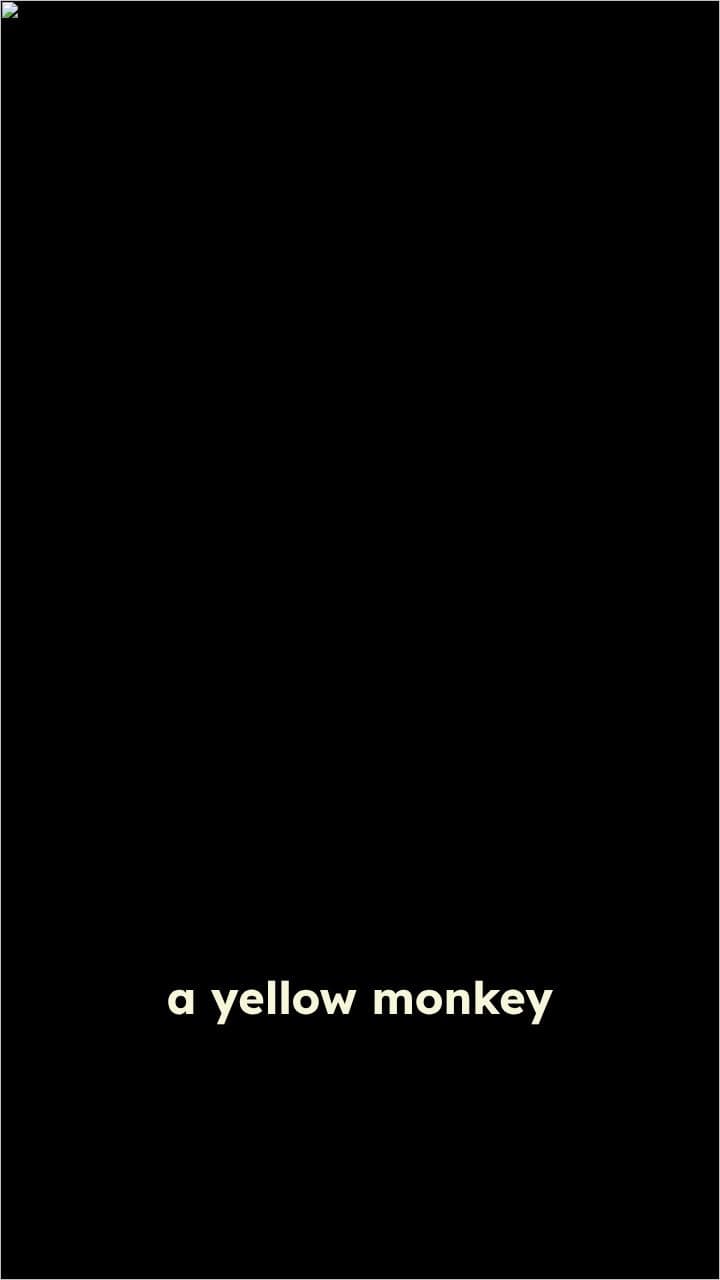 Yellow Monkey Singing with a Microphone