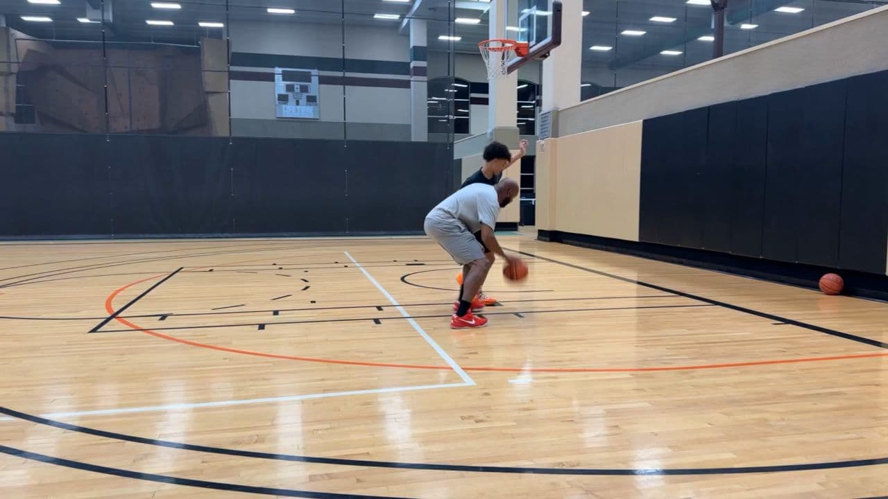 Dad Teaches Son Basketball Skills