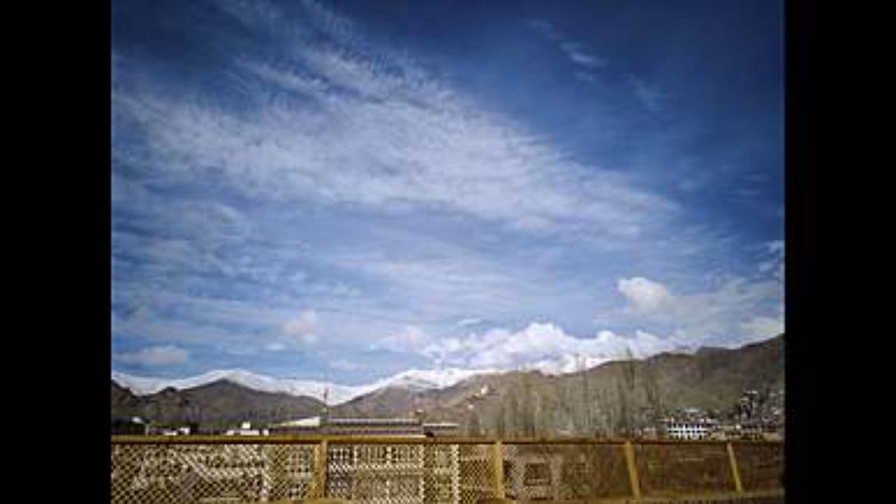 Journey Through Saturn's Rings and Moons