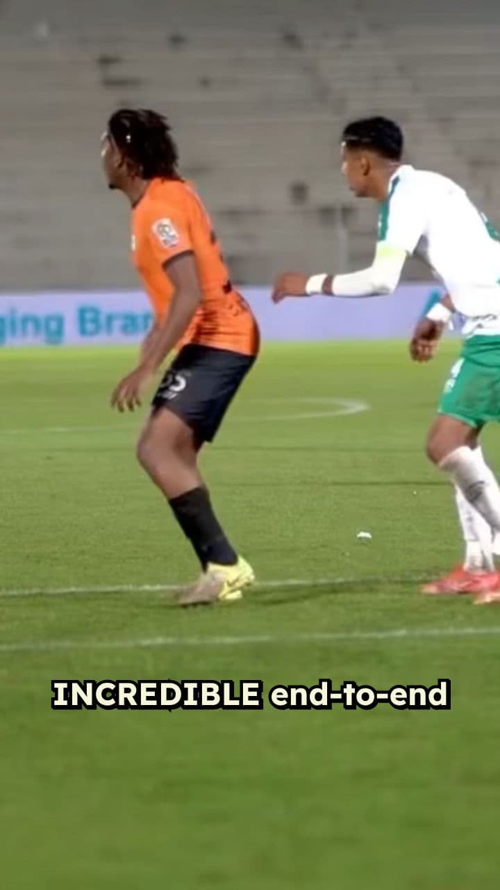 Midfield Clash: White vs. Orange Action