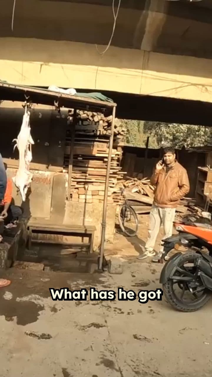 Dismembering a Goat on the Street