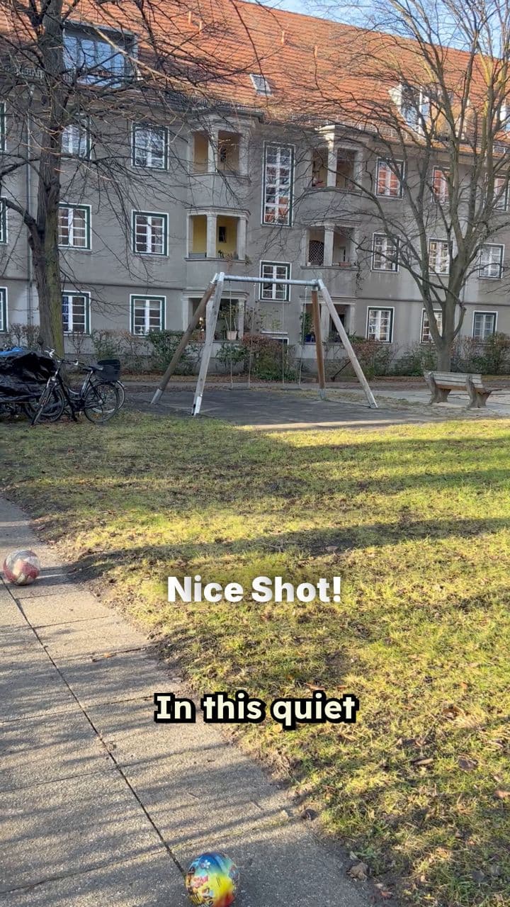 Red Ball Hits Swing Set Post
